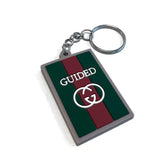 Gucci guided sleutelhanger met groene en rode strepen en interlocking GG logo